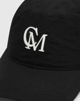 Camilla and Marc James Cap Black