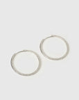 Arms of Eve Sebastian Silver Hoop Earrings