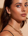 Arms of Eve Jean Huggie Earrings Gold