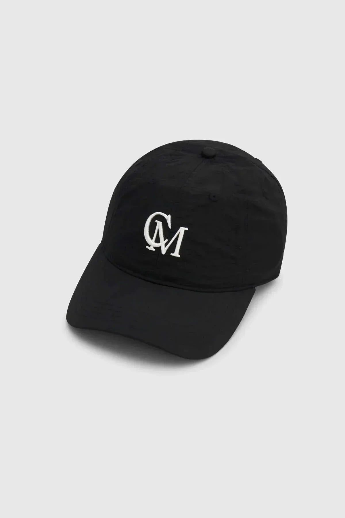 Camilla and Marc James Cap Black