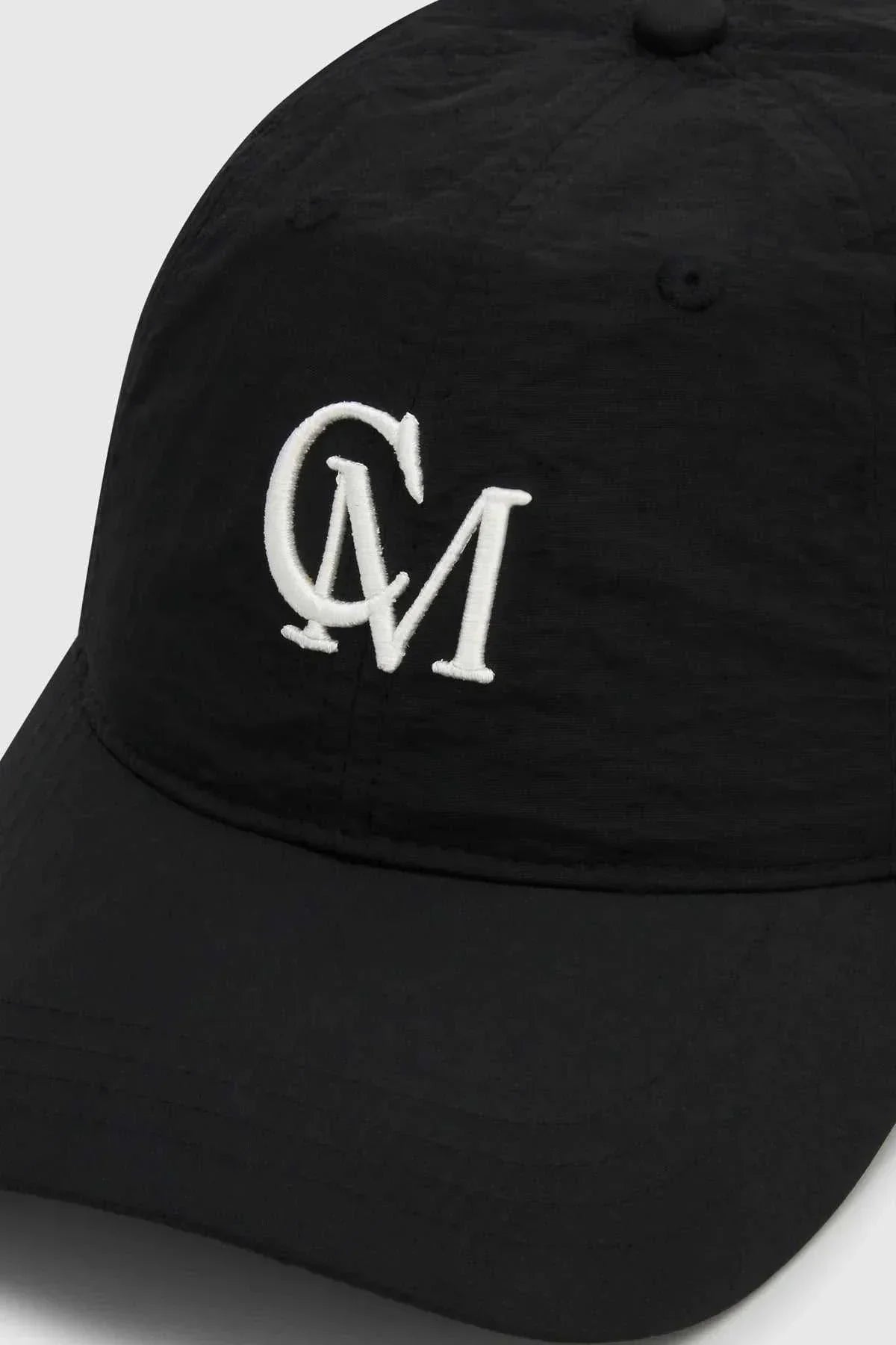 Camilla and Marc James Cap Black