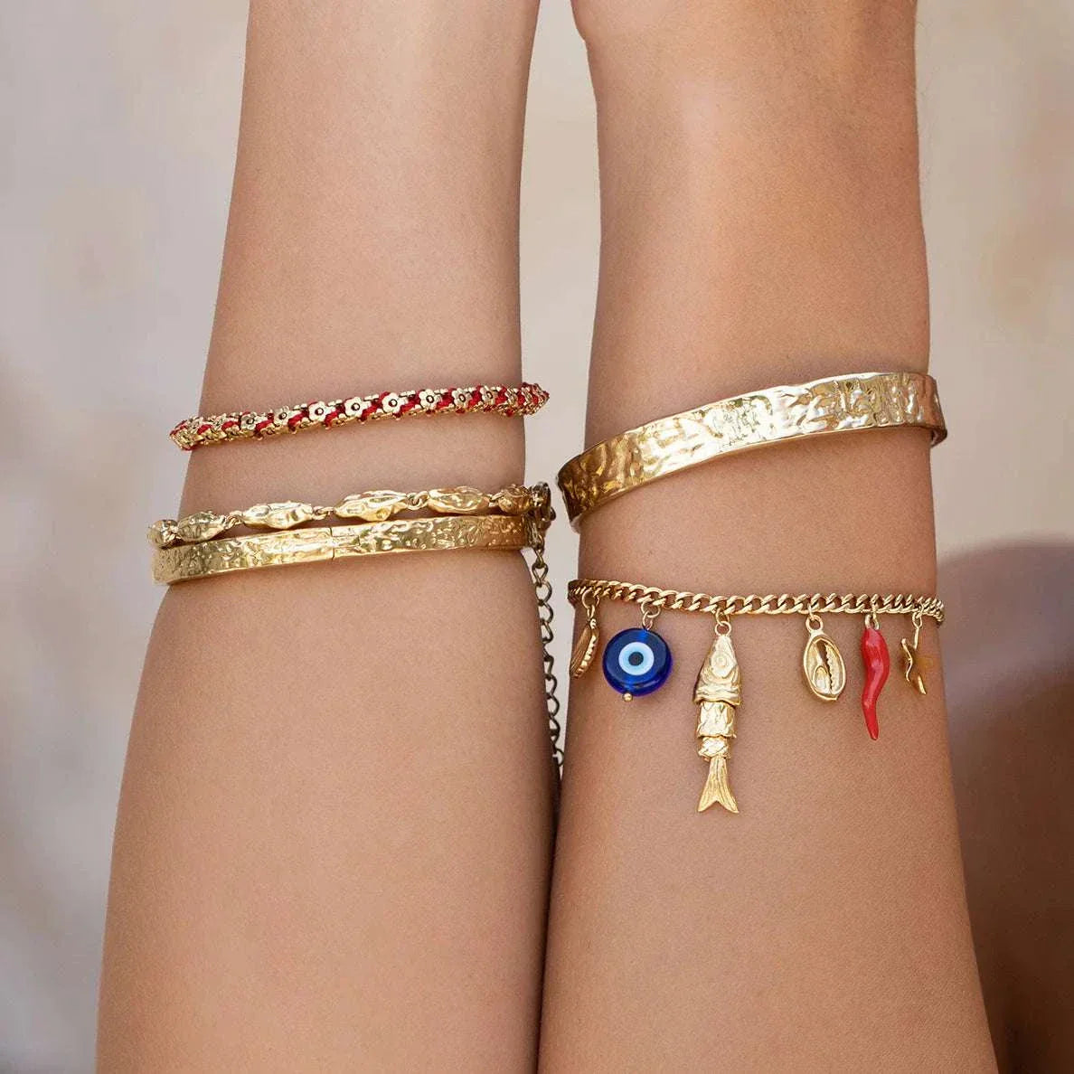 Arms of Eve Oceanus Charm Bracelet