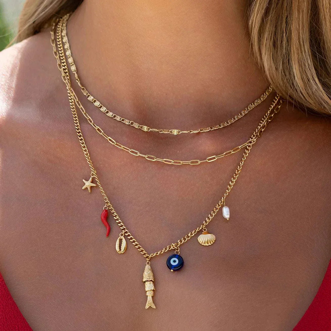 Arms of Eve Oceanus Charm Necklace