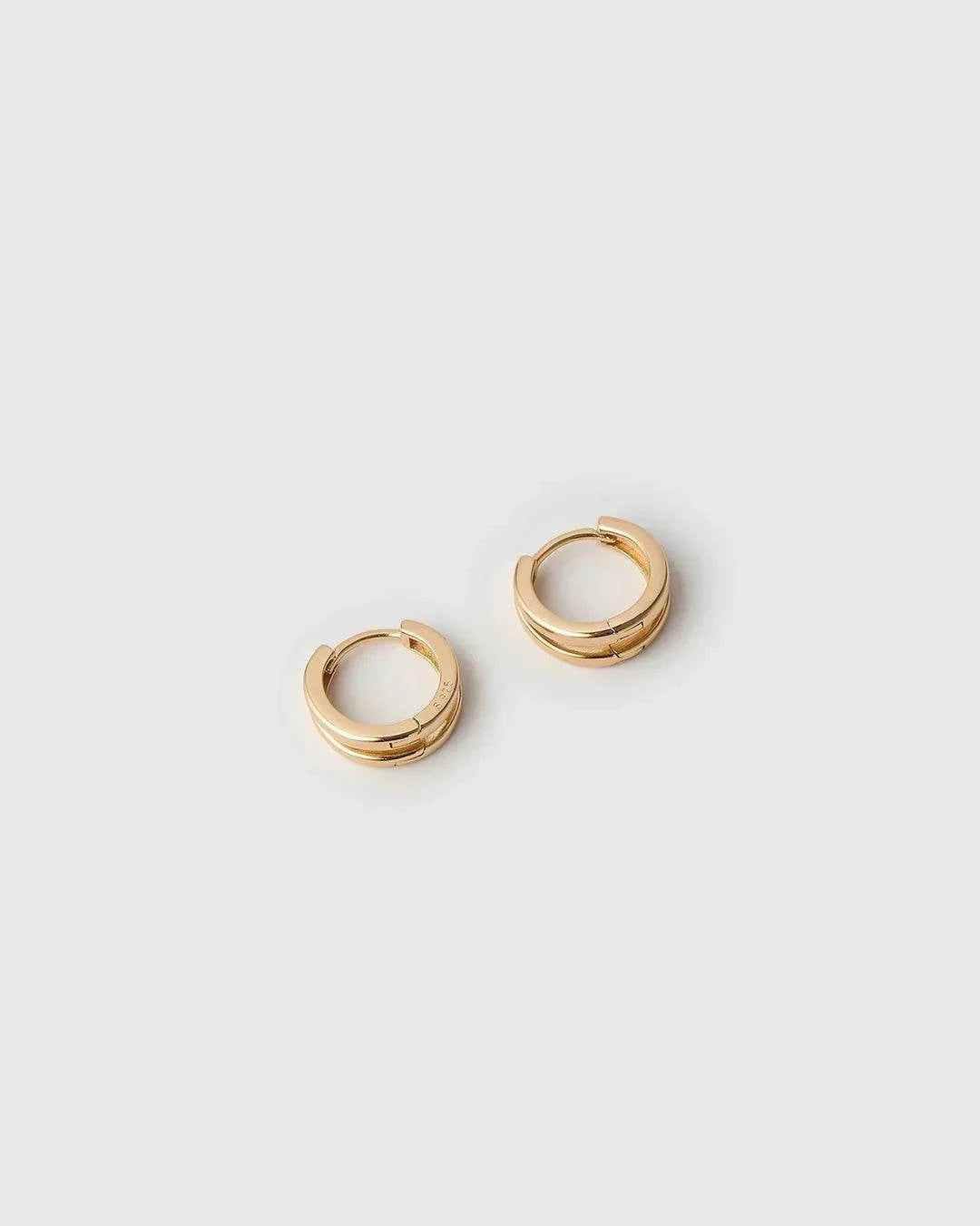 Arms of Eve Jean Gold Huggie Earrings