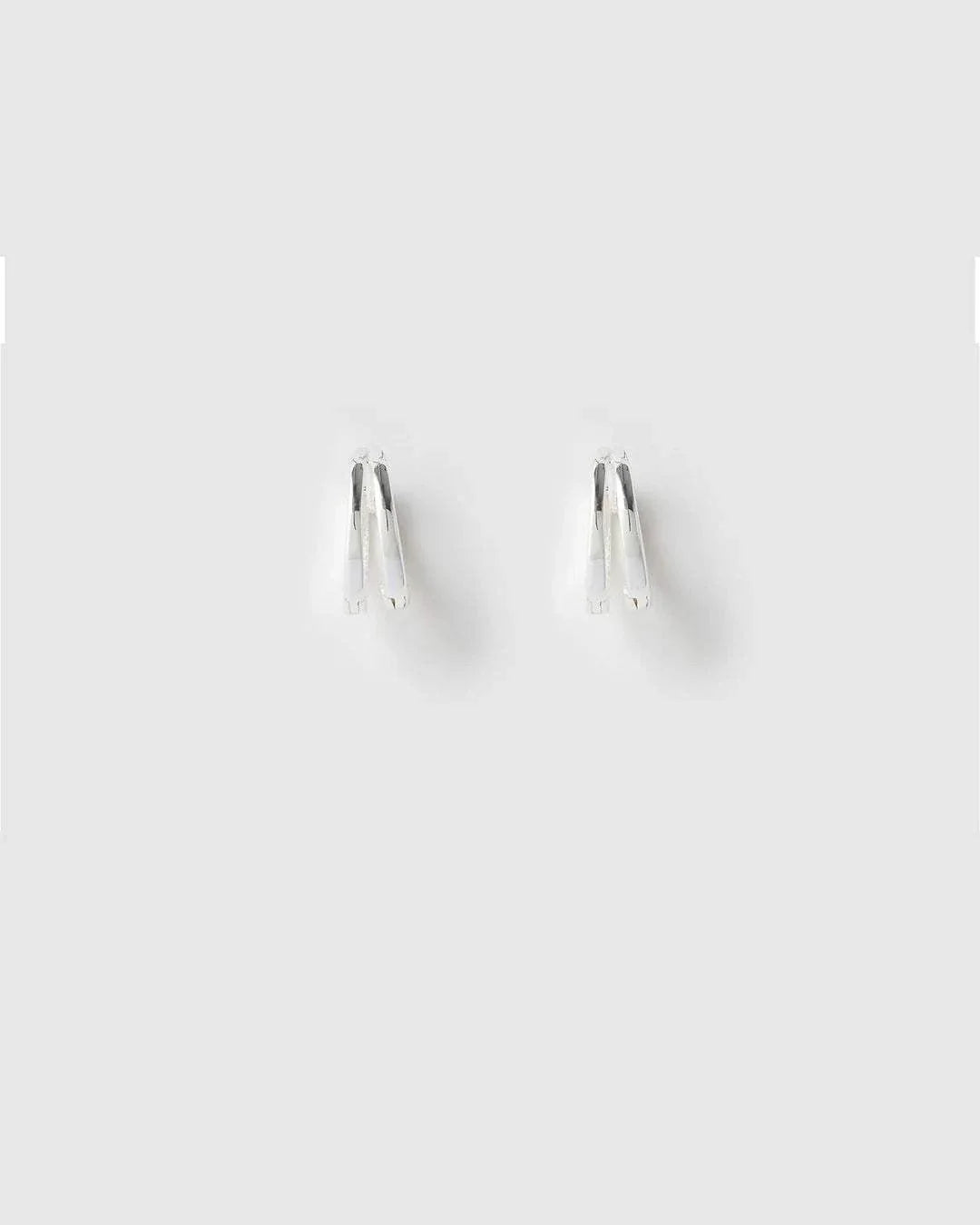 Arms of Eve Jean Silver Huggie Earrings