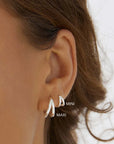 Arms of Eve Jean Silver Huggie Earrings