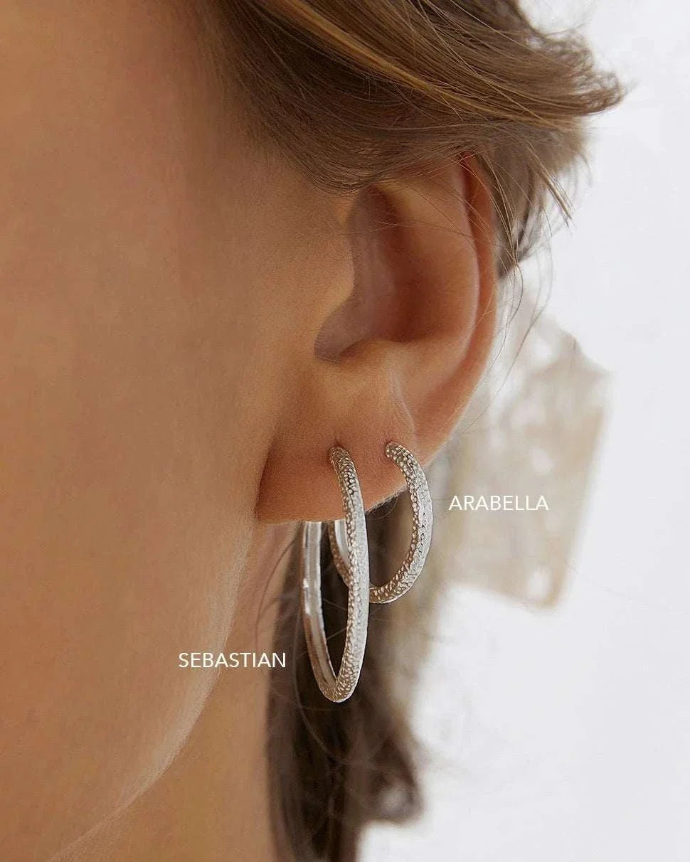 Arms of Eve Sebastian Silver Hoop Earrings
