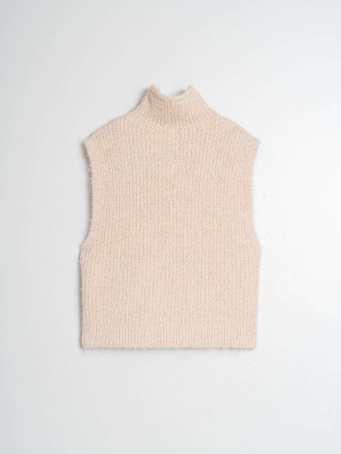 Indi and Cold Chaleco Turtle Neck Crudo