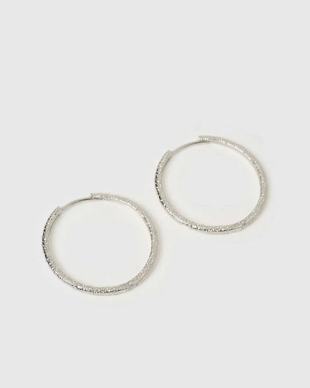 Arms of Eve Sebastian Silver Hoop Earrings