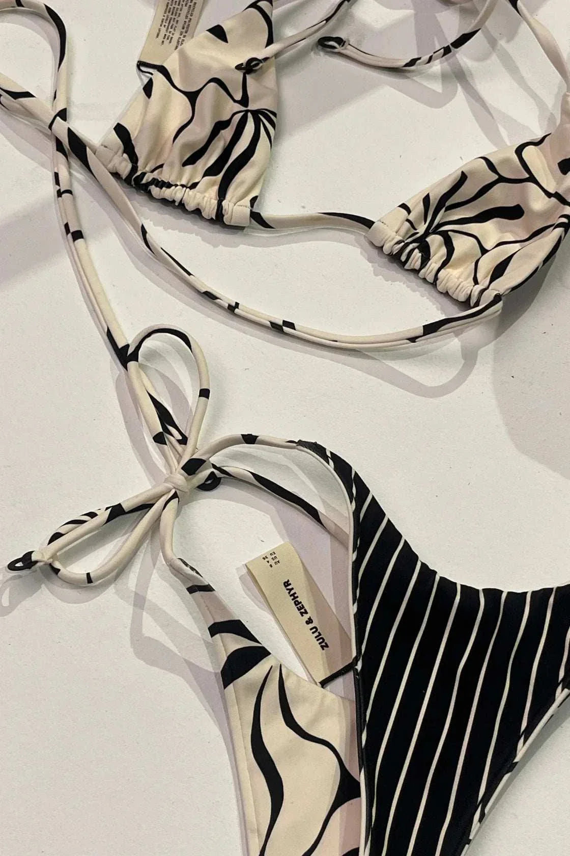 Zulu and Zephyr Reversible Tie Triangle Top Cream Flower