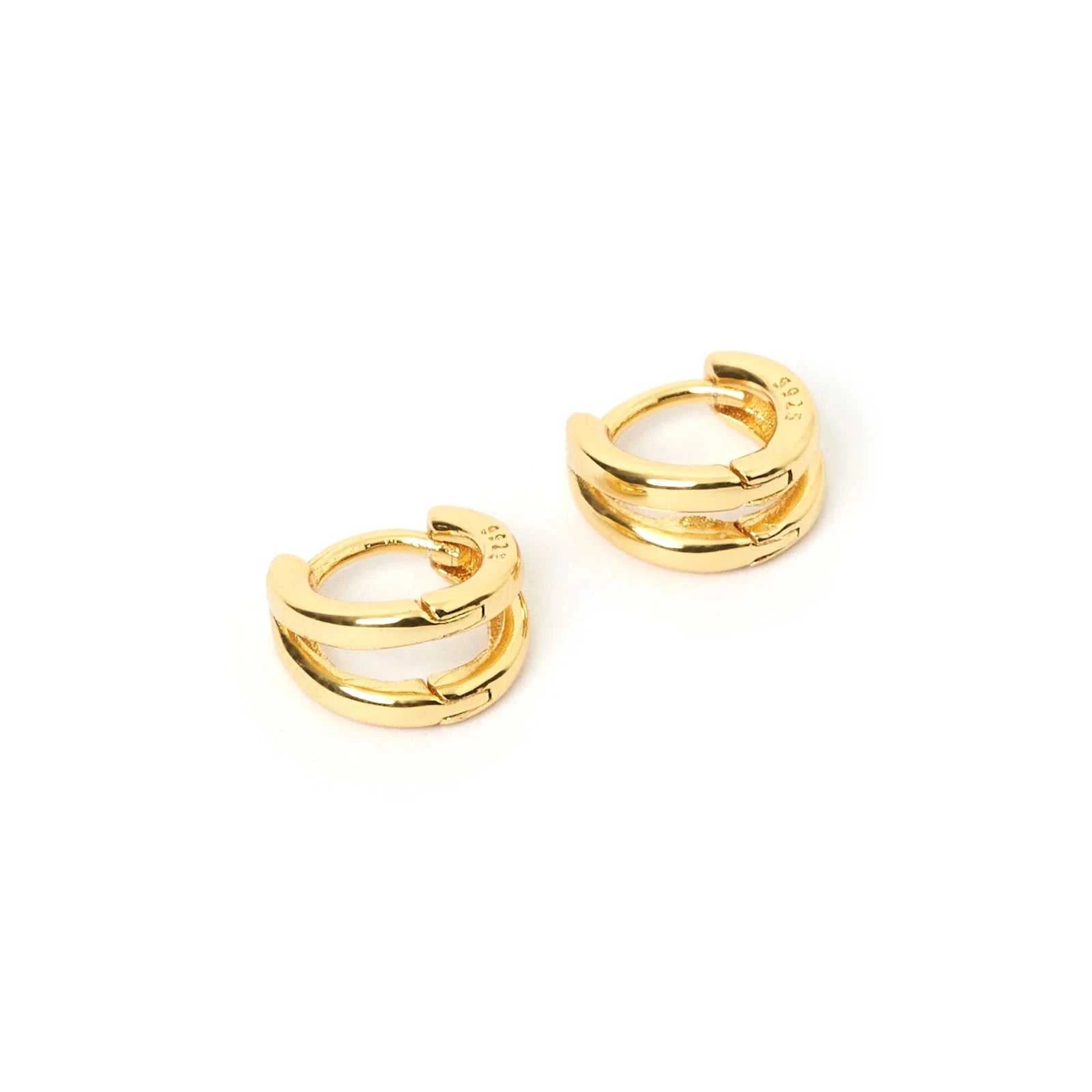 Arms of Eve Jean Huggie Earrings Gold
